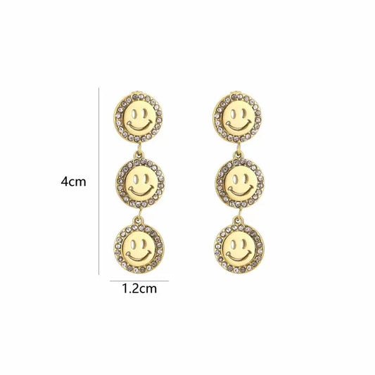 oorbellen- smileys steentjes zilverkleurig