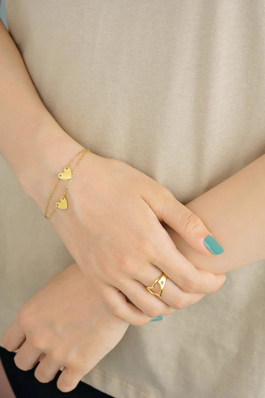Armbandje- hartjes 2x goudkleurig