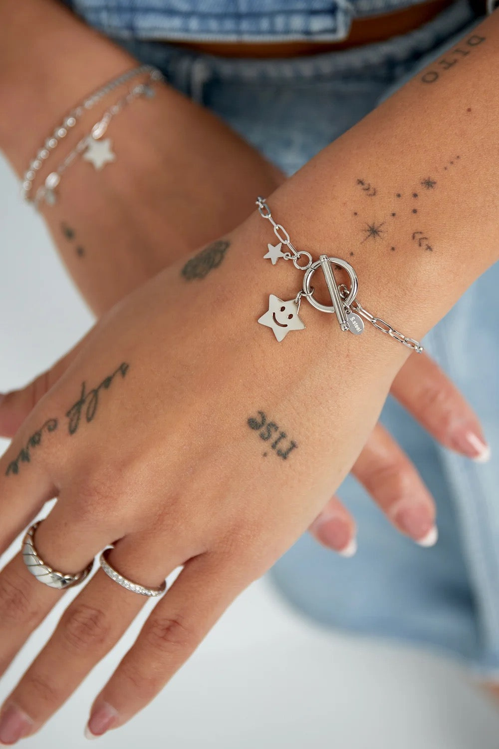 Armbandje- ster smiley zilverkleurig