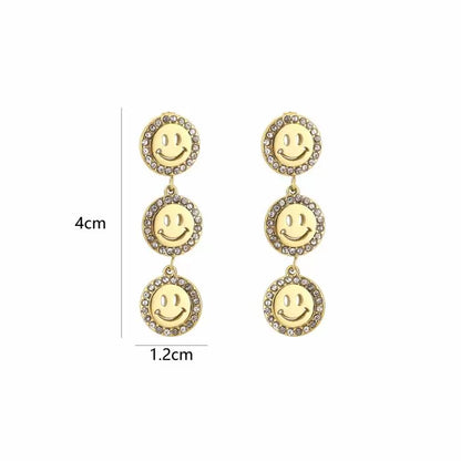 oorbellen- smileys steentjes zilverkleurig