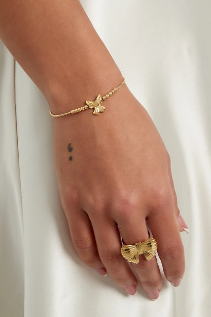 Armbandje- klein strikje zilverkleurig