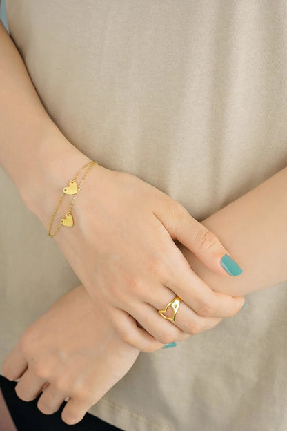 Armbandje- hartjes 2x zilverkleurig