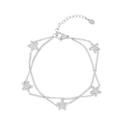 Armbandje- meerdere bloemetjes zilverkleurig