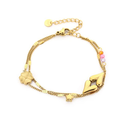 Armbandje- dubbel hartje goudkleurig