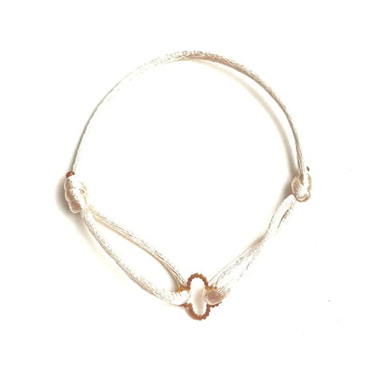Wit koord armbandje met bloemvormige bedel, stainless steel sieraad van Jewelrybyceline