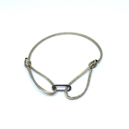 Stainless steel armband met beige touw, minimalistisch ontwerp van Jewelrybyceline sieraden.