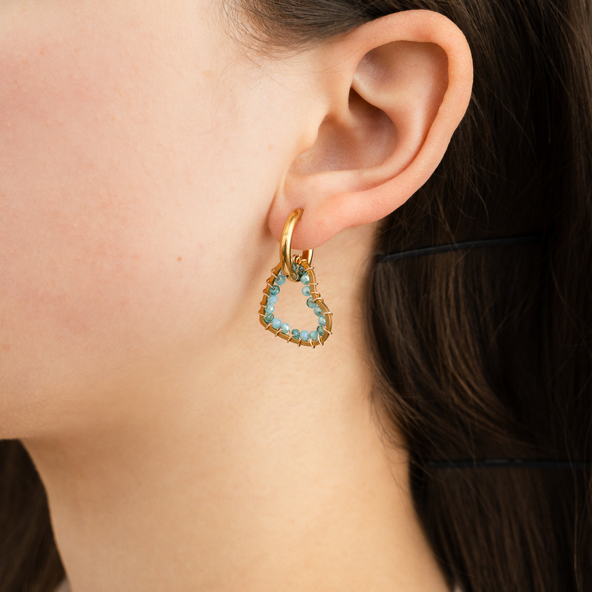 oorbellen- hart kraaltjes blauw goudkleurig