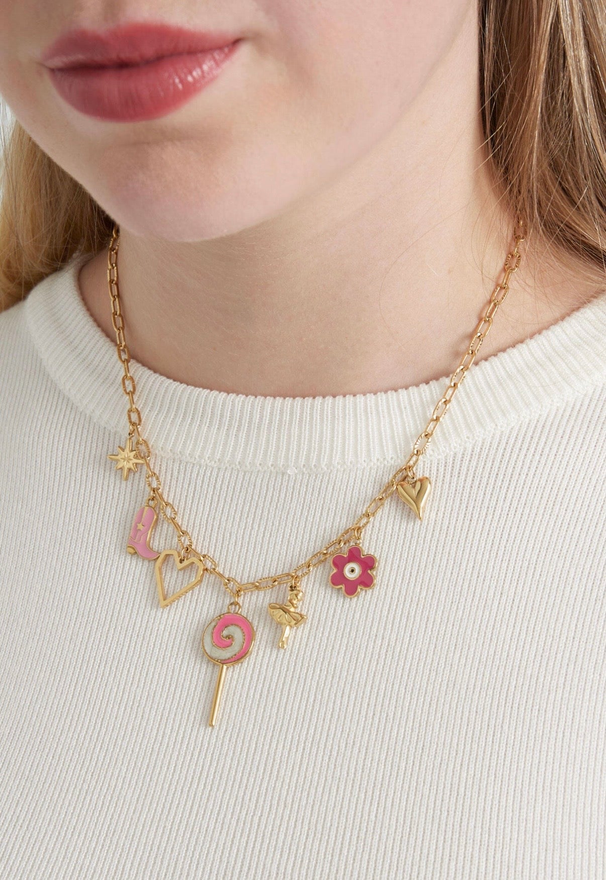 bedel ketting met een lolly, bloem. cowboylaars, hart foto