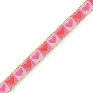 lint armbandje met roze hartjes blokjes er op
