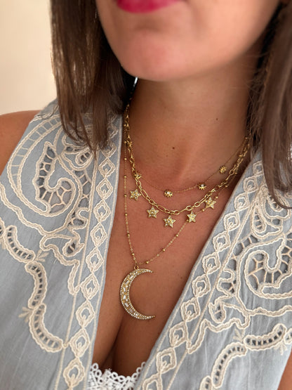 necklace stack met meerdere kettingen met sterren en maan goudkleurig 