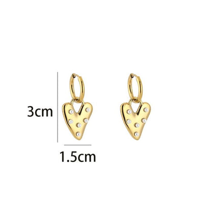 oorbellen hartje met pareltjes goudkleurig met afmetingen stainless steel