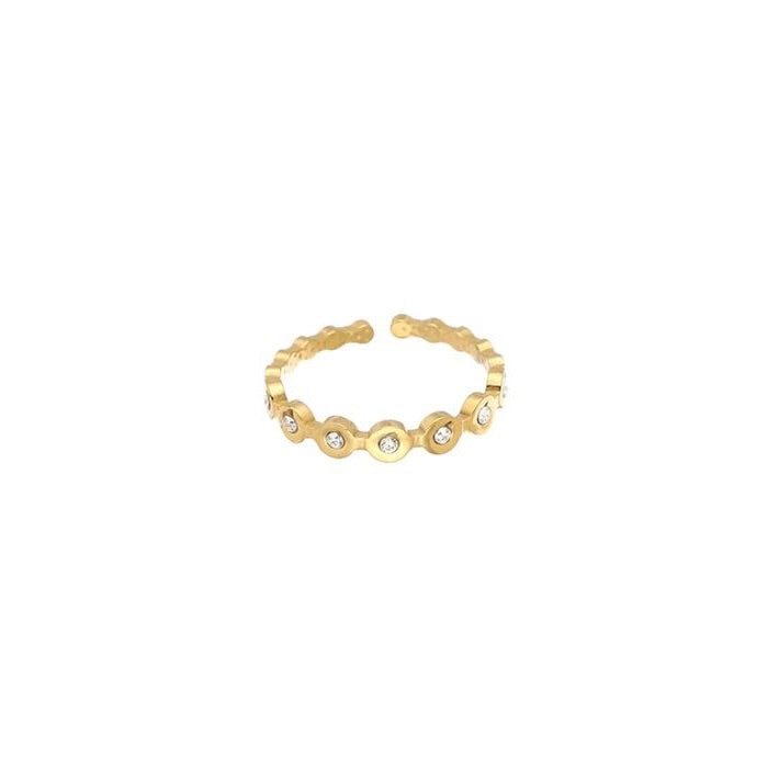 Goudkleurige ring met rondjes en steentjes van stainless steel